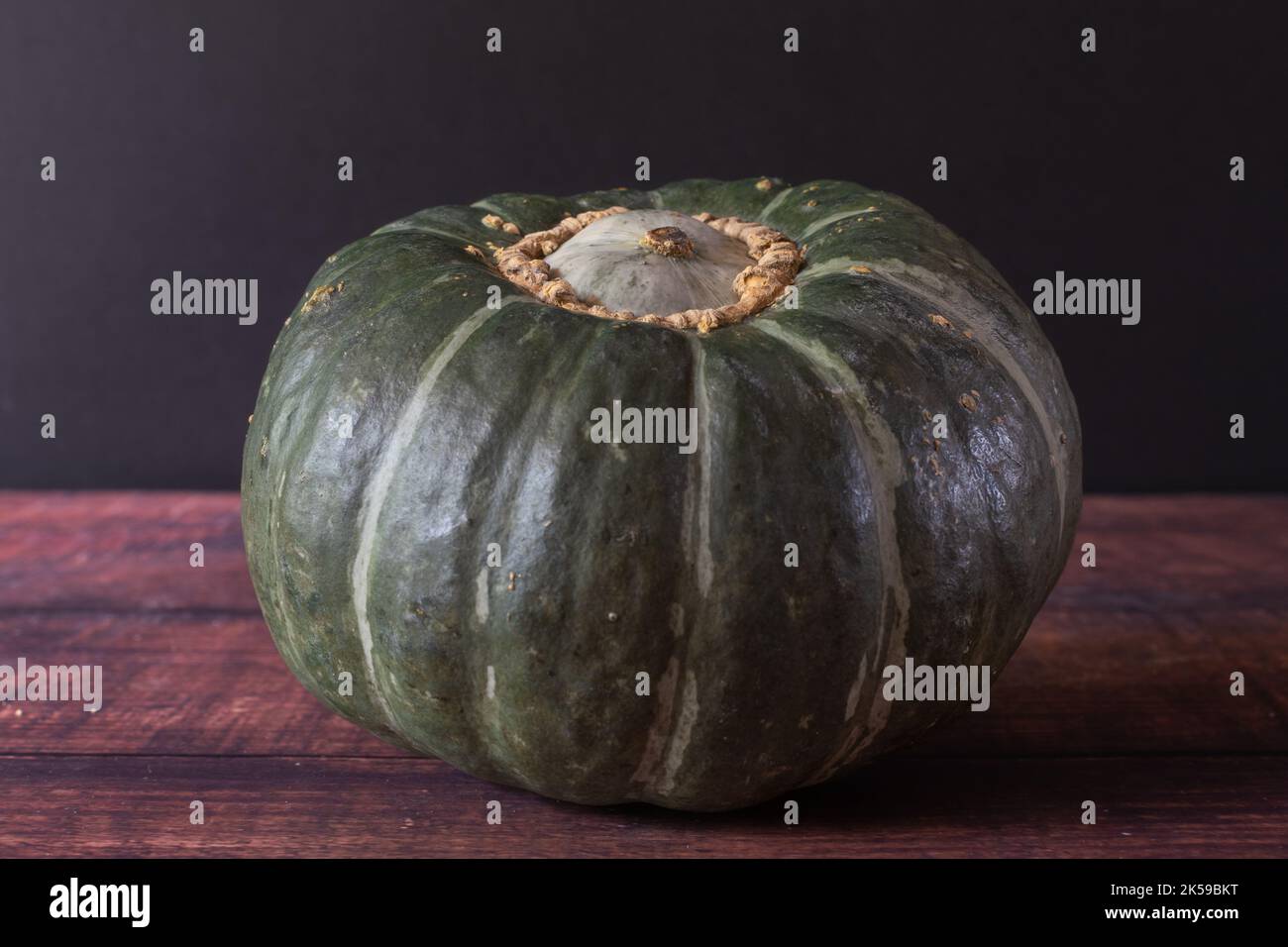 An isolated Japanese pumpkin ready to be cubed and roasted Stock Photo