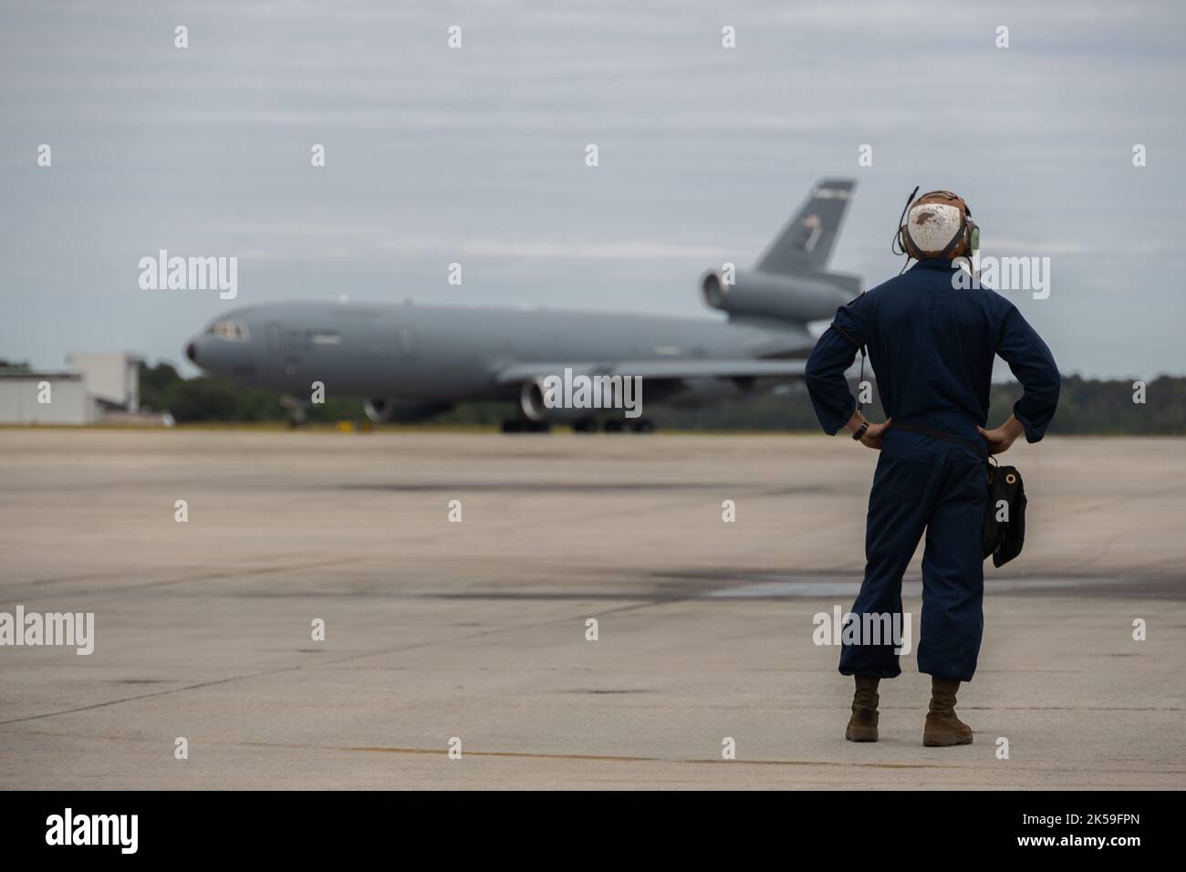 A U.S. Marine with Marine Fighter Attack Squadron (VMFA) 312, Marine ...