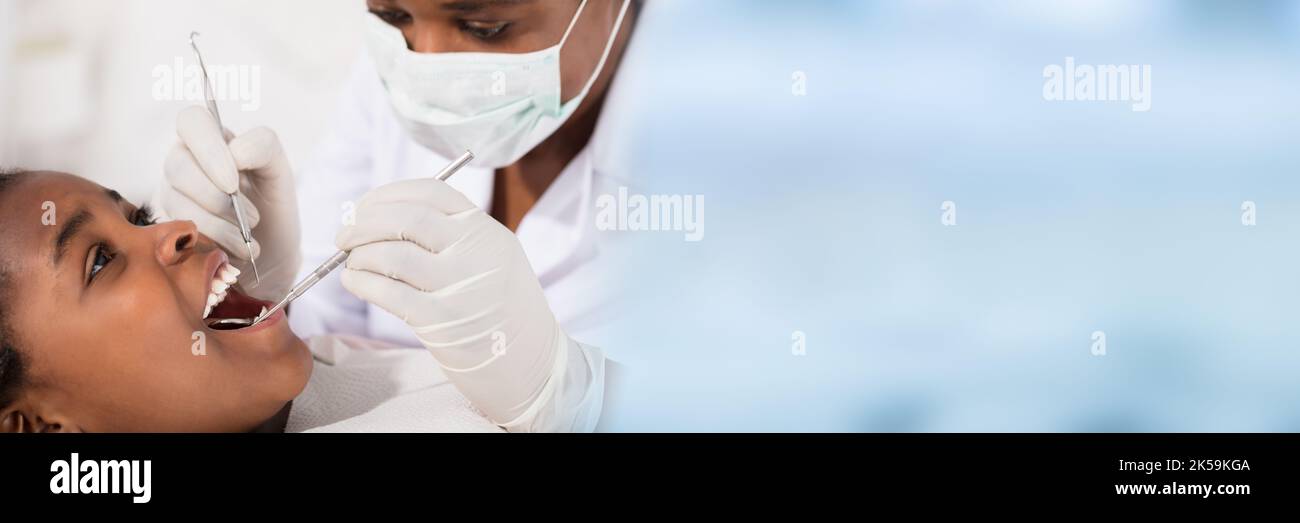 African American Dentist Doing Dental Patient Checkup Stock Photo Alamy