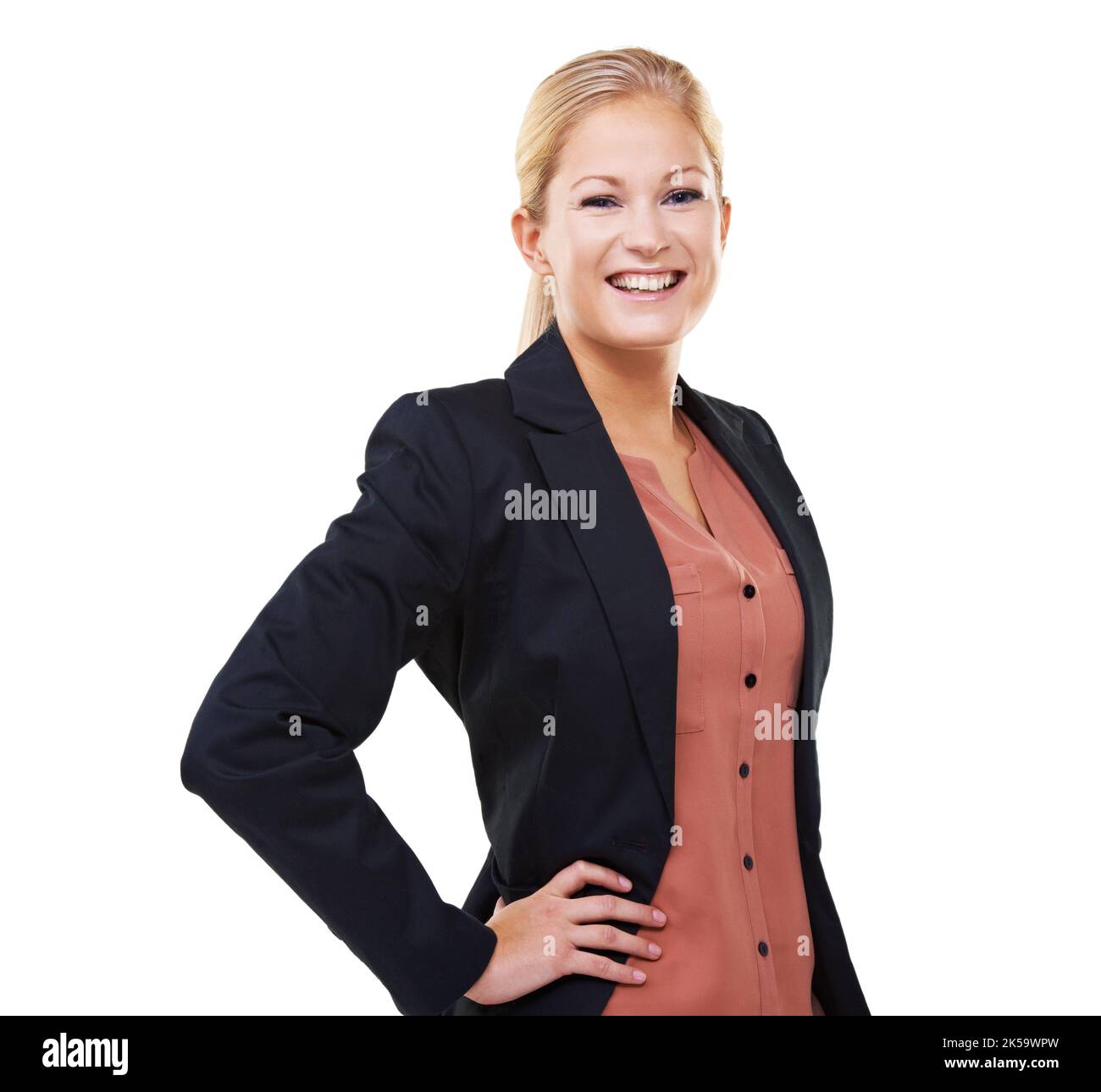 Feminine businesswoman. Portrait of a beautiful young businesswoman with hands on her hips. Stock Photo