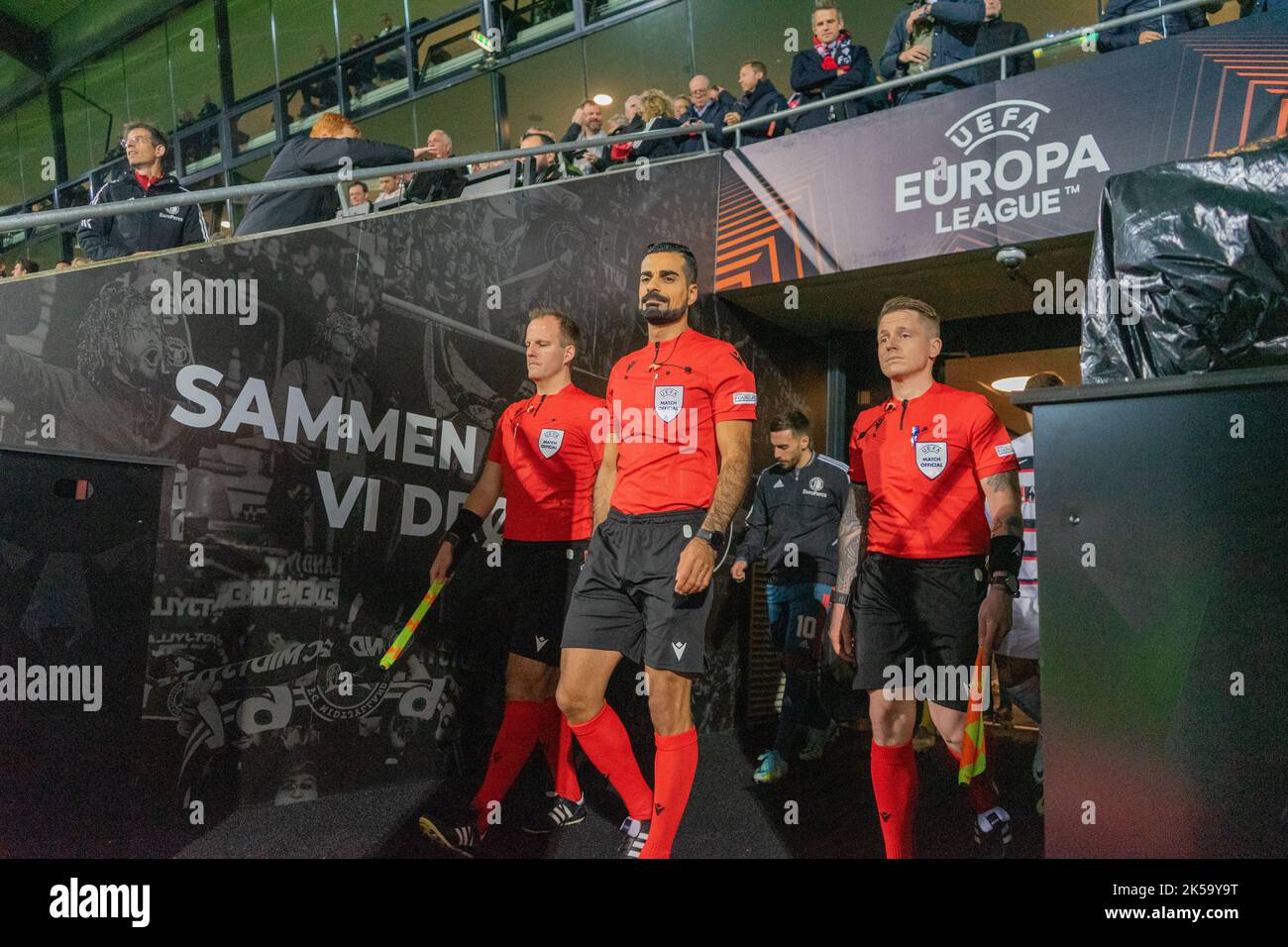 Herning, Denmark. 06th Oct, 2022. Referee Mohammed Al-Hakim enters the pitch with his linesmen for the UEFA Europa League match between FC Midtjylland and Feyenoord at MCH Arena in Herning. (Photo Credit: Gonzales Photo/Alamy Live News Stock Photo