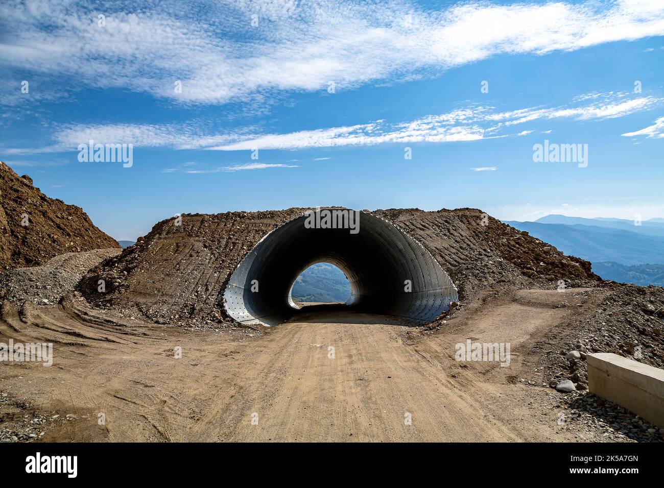 Road tunnel under construction in the final area of the new road in the mountain resort Parang Stock Photo