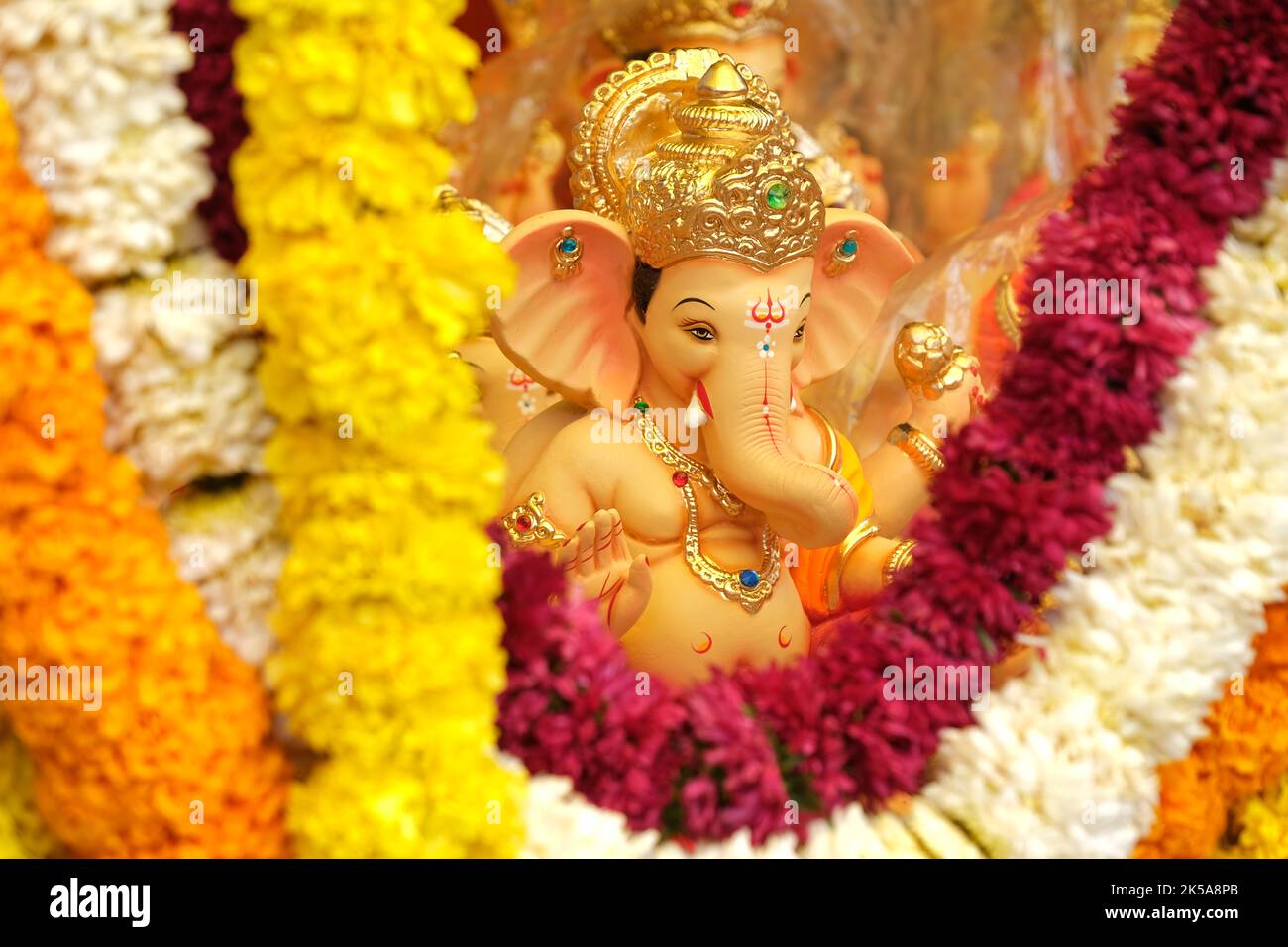 19 August 2022, Pune, India, Ganesha or Ganapati for sale at a shop on the event of Ganesh festival in India, Eco friendly God Ganesha Statue made fro Stock Photo