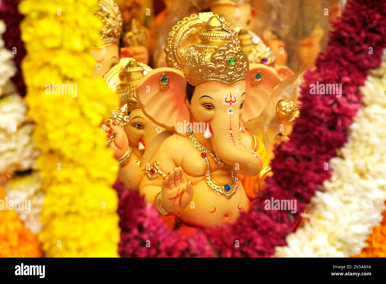 19 August 2022, Pune, India, Ganesha or Ganapati for sale at a shop on the event of Ganesh festival in India, Eco friendly God Ganesha Statue made fro Stock Photo