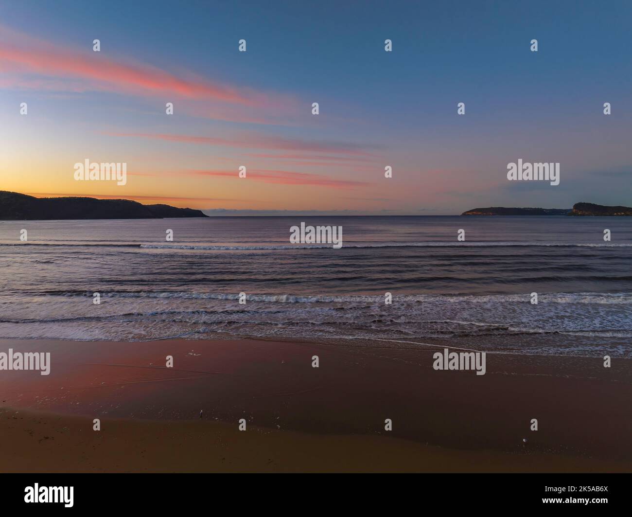 Winter sunrise at Ocean Beach in Umina Beach on the Central Coast, NSW, Australia. Stock Photo