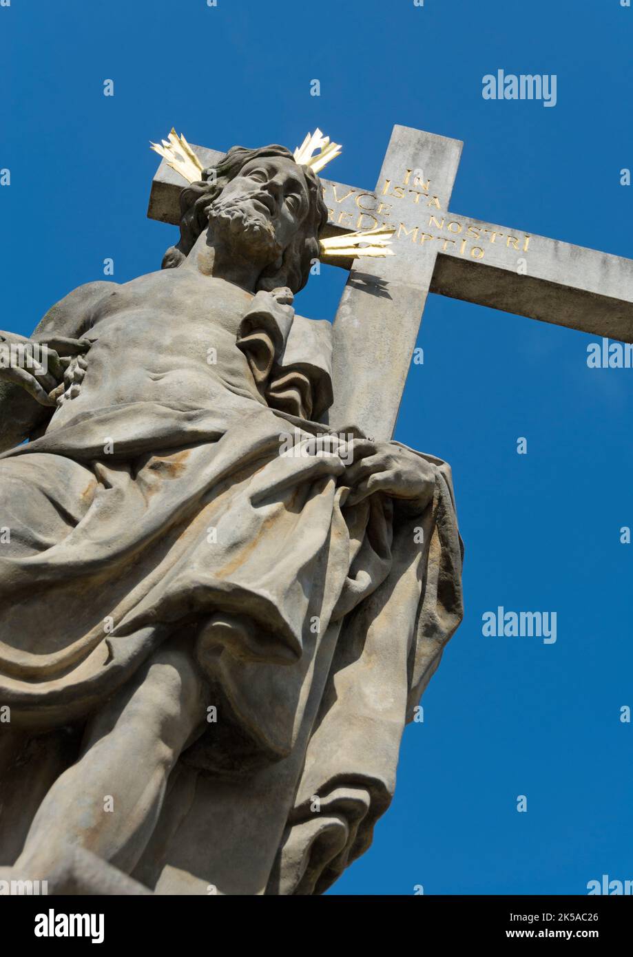 Prague Charles Bridge, Czech Republic: Jesus statue carries the cross Stock Photo