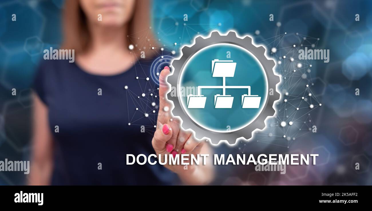 Woman touching a document management concept on a touch screen with her ...