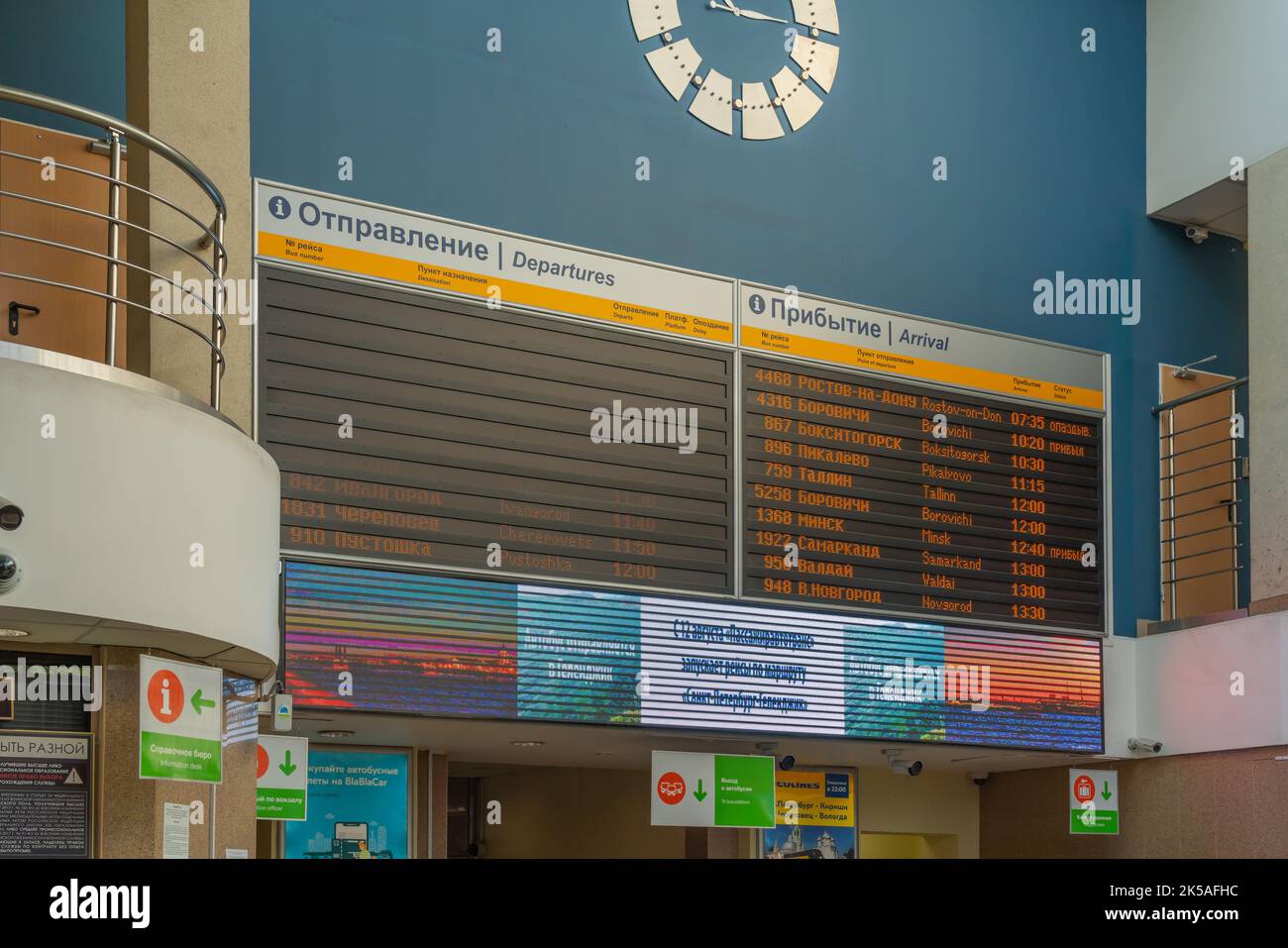 SANKT PETERSBURG , RUSSIA - AUGUST 27.2022: Busstation scoreboard of St. Petersburg with sign from busses to Helsinki, Tallin und Russian towns Stock Photo