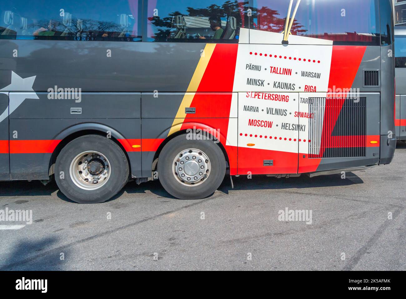 Busstation of St. Petersburg with sign on a bus to Helsinki, Tallin, Vilnus, Riga. Stock Photo