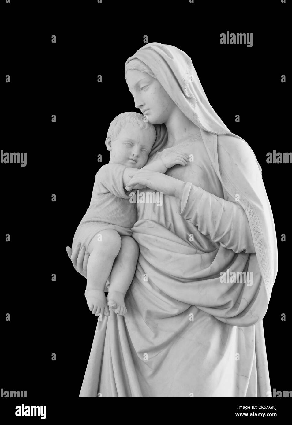 Virgin Mary and child Christ in her arms statue isolated on white background with clipping path. Madonna with baby sculpture Stock Photo