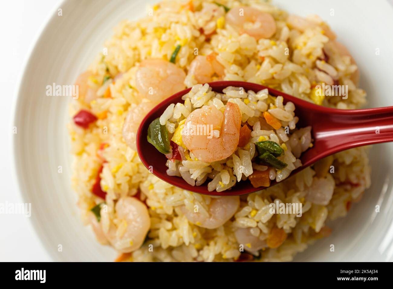 Shrimp fried rice on white background Stock Photo - Alamy