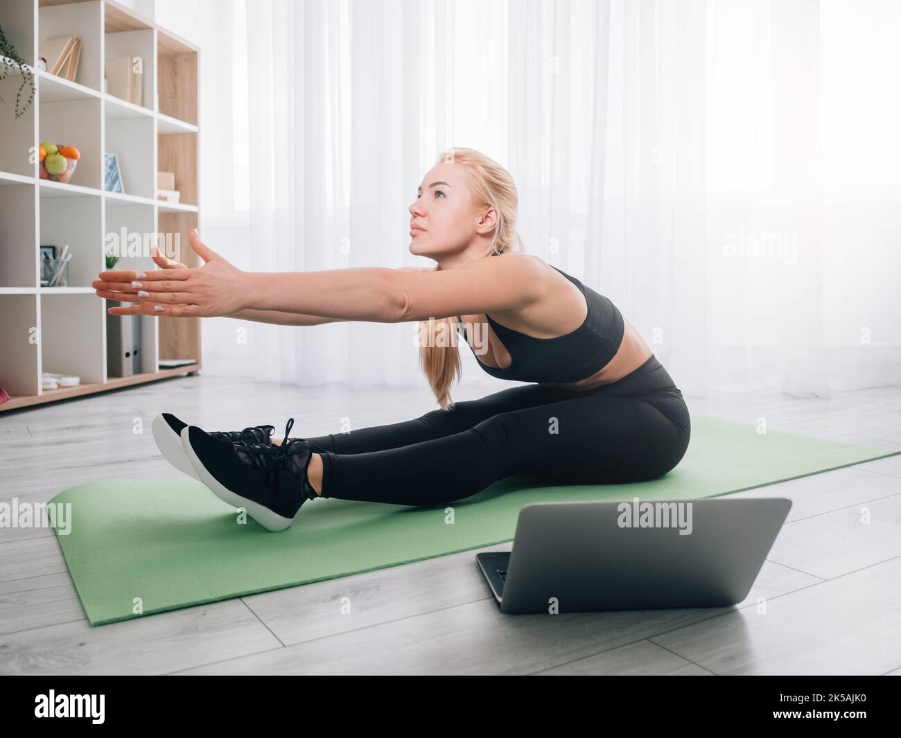 home stretching sportive woman enjoying fitness Stock Photo Alamy