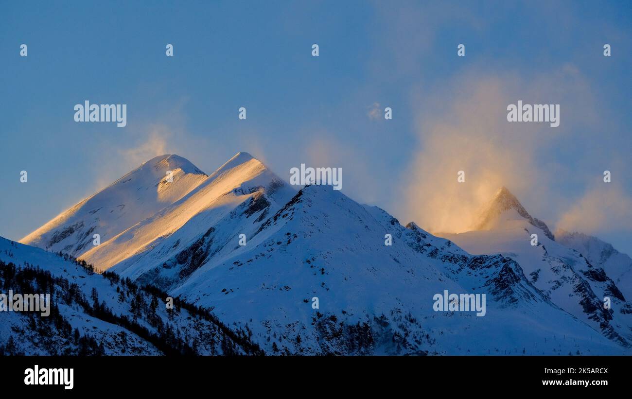 A high mountain alps covered with snow during winter Stock Photo - Alamy