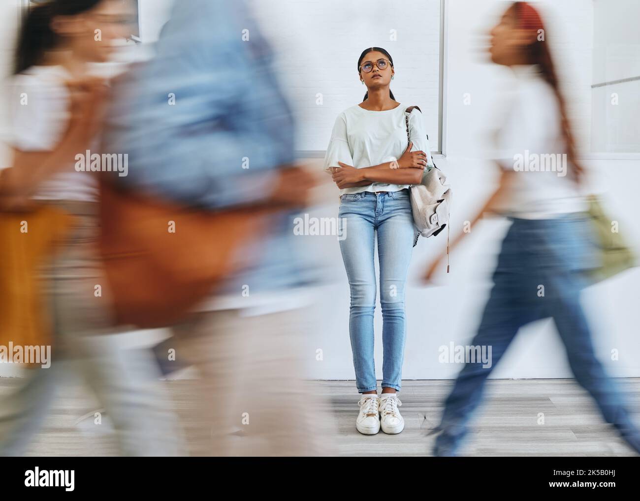 Woman alone in a crowd hi-res stock photography and images - Alamy