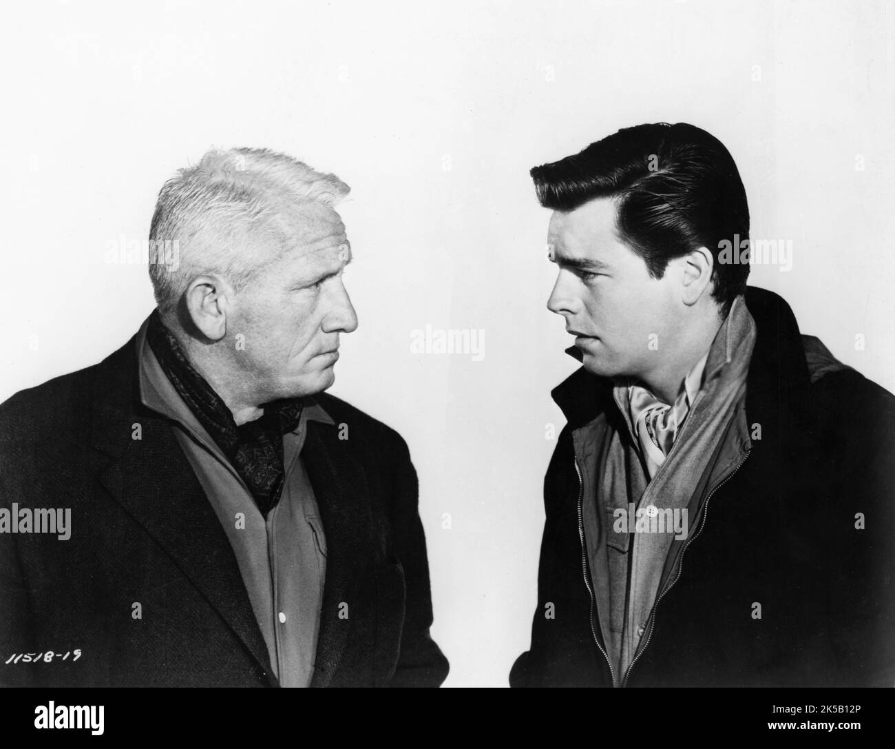 SPENCER TRACY and ROBERT WAGNER portrait in THE MOUNTAIN 1956 director / producer EDWARD DMYTRYK novel Henri Troyat Paramount Pictures Stock Photo