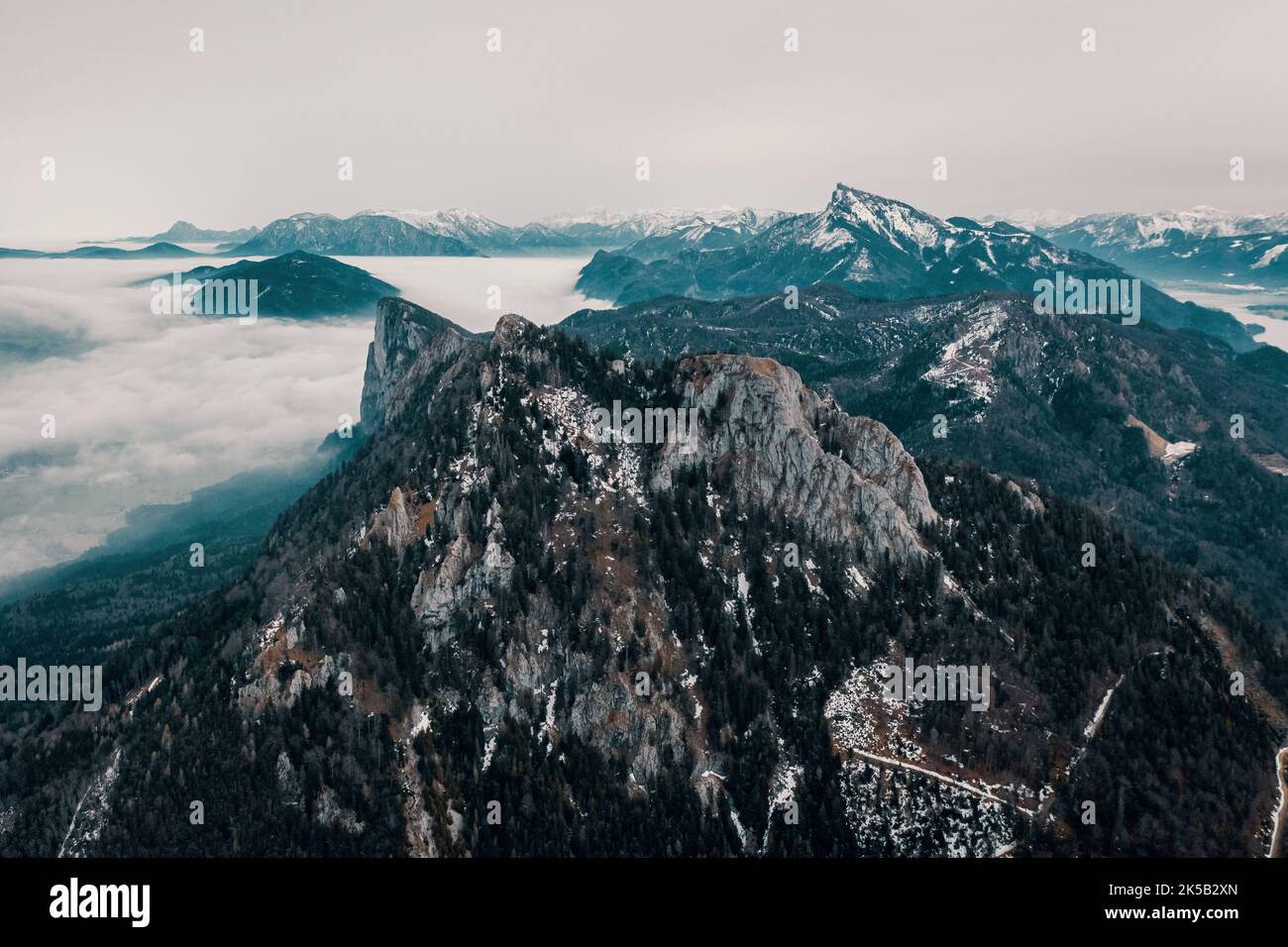 An aerial view of ridge steep Alpine peaks in Salzkammergut, Austria on ...