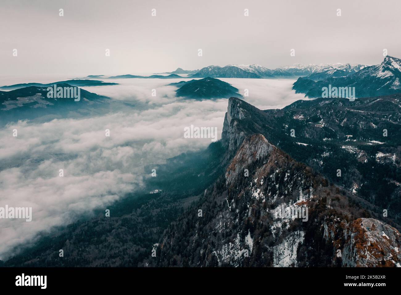 An aerial view of ridge steep Alpine peaks in Salzkammergut, Austria on ...