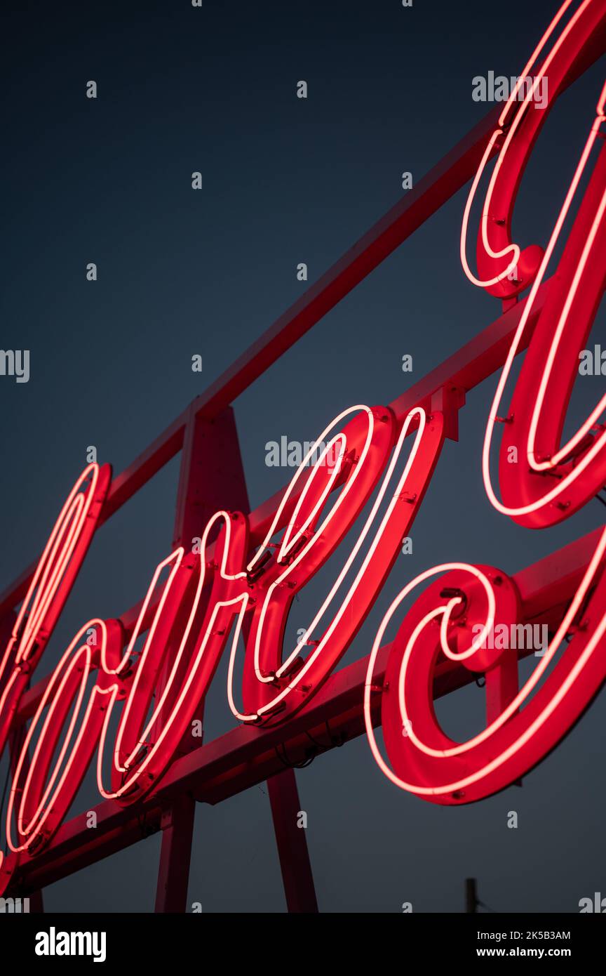 Red neon symbol in dark hi-res stock photography and images - Alamy