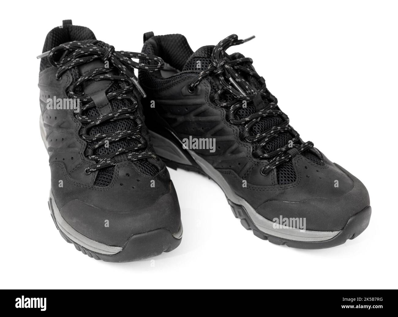 Black trekking boots isolated on white background Stock Photo