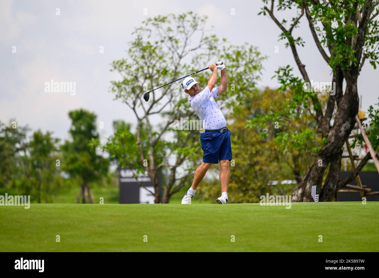 Louis Oosthuizen of South Africa tees off at 9 during the 1st round of the LIV Golf Invitational Bangkok at Stonehill Golf Course in Bangkok, THAILAND Stock Photo