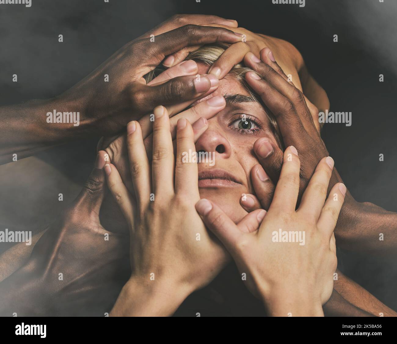 Anxiety, schizophrenia and hands woman with mental health, bipolar and trauma feeling paranoid, hallucination and crazy. Scared, fear and hopeless Stock Photo