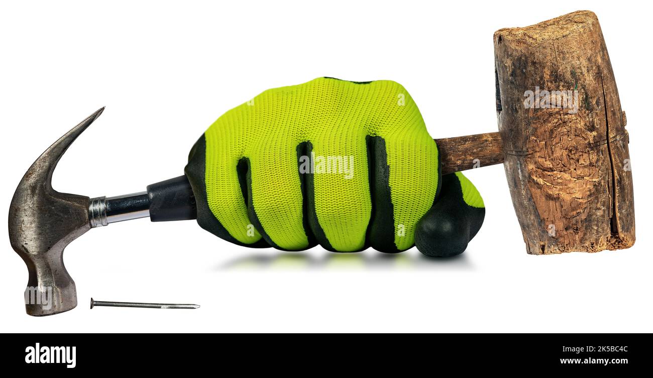 Hand with work glove holding an old steel claw hammer with black rubber ...