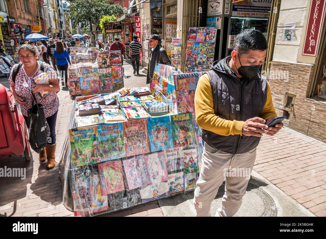 Bogota Colombia,Veracruz Calle 16 pedestrian only sidewalk display vendor stalls books Spanish language,near Santander Park Parque Santander,store sto Stock Photo