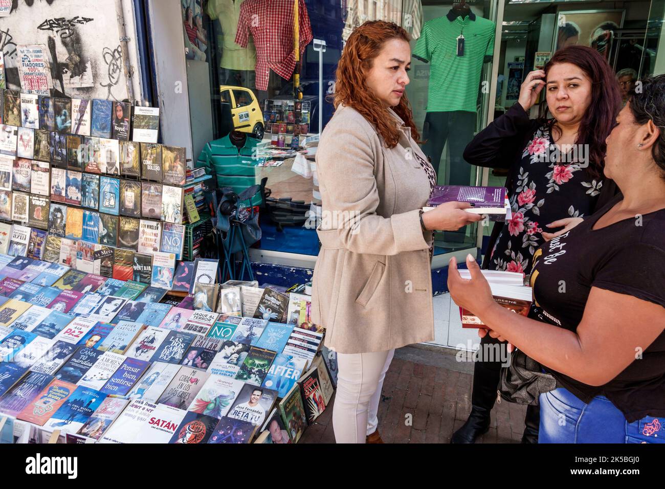 Bogota Colombia,Veracruz Calle 16 sidewalk display vendor books Spanish