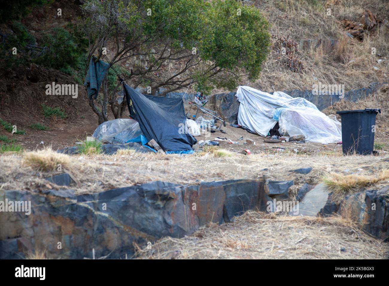 Vagrant Setting up Makeshift Shelter on Signal Hill in Cape Town, South Africa Stock Photo