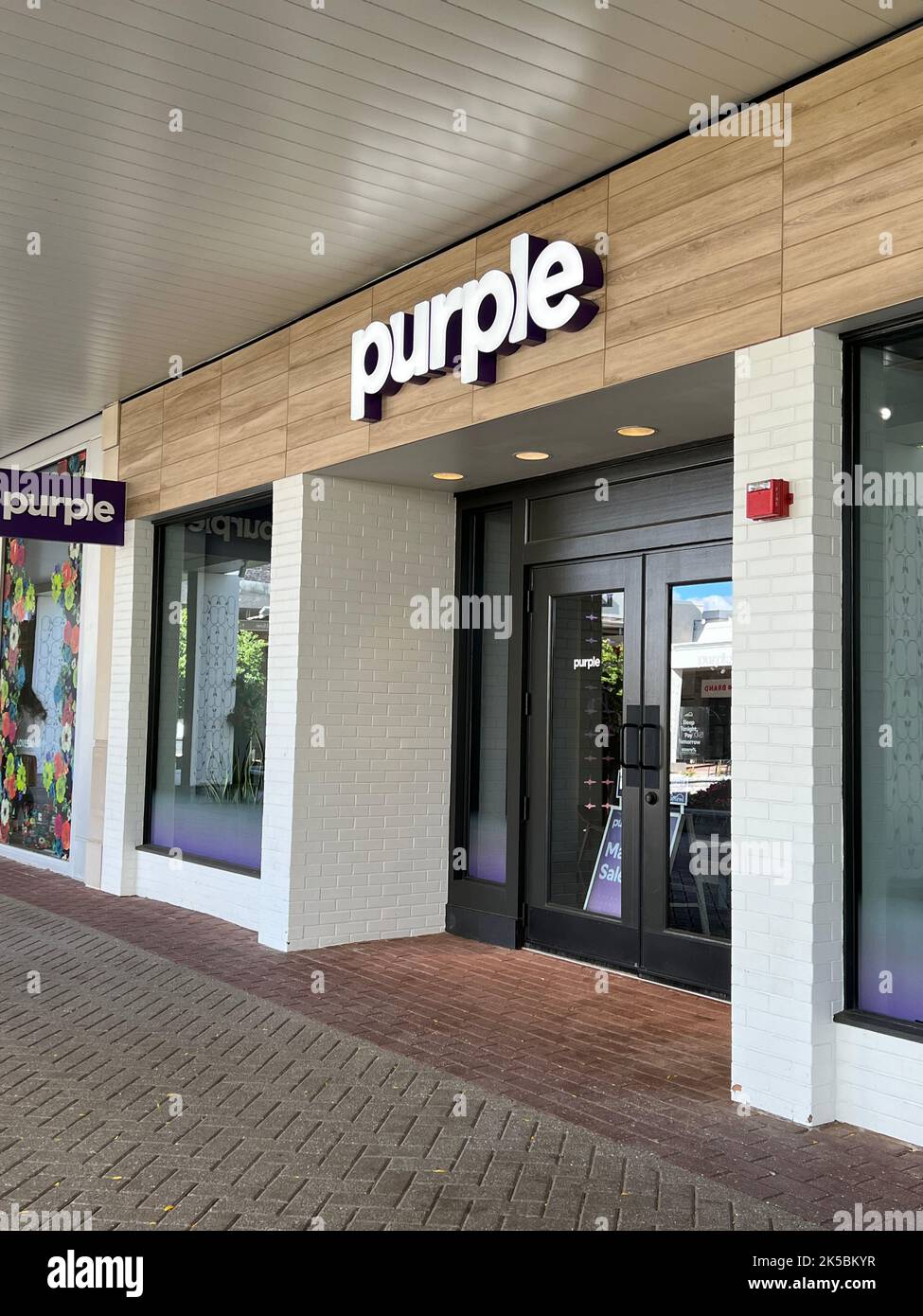 Retail storefront for the mattress company, Purple, at Old Orchard