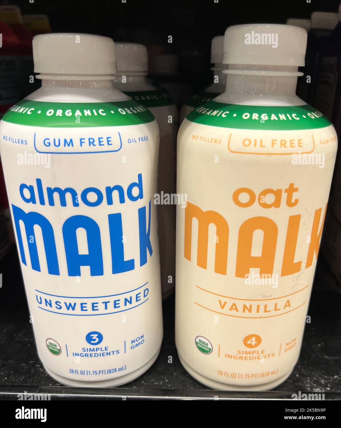 Oat Malk and Almond Malk non dairy beverages in the refrigerator case