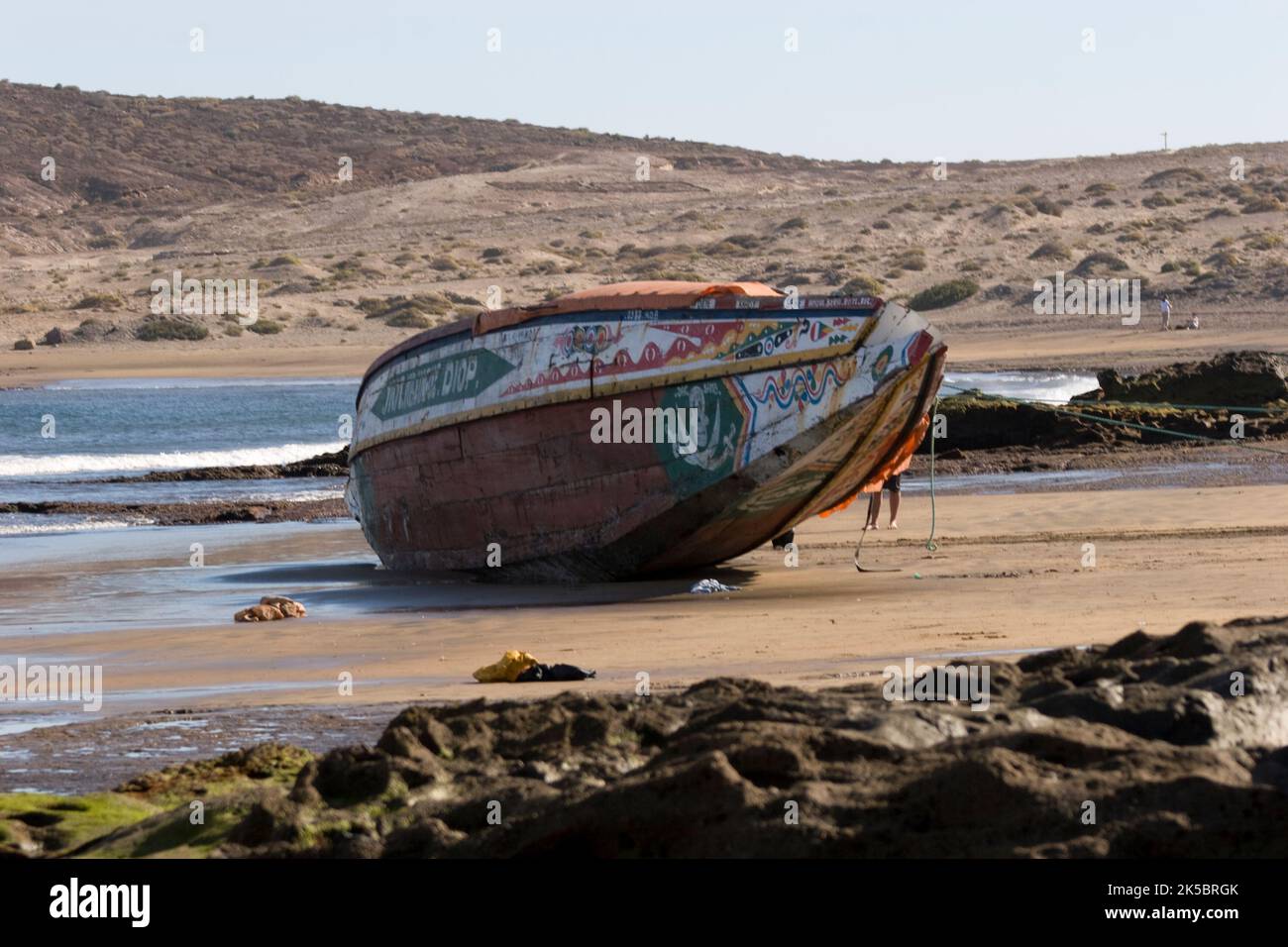 A cayuco (boat) which an hour earlier had landed with illegal immigrants form Africa - Tenerife EL Medano. Photo by Nikki Attree Stock Photo