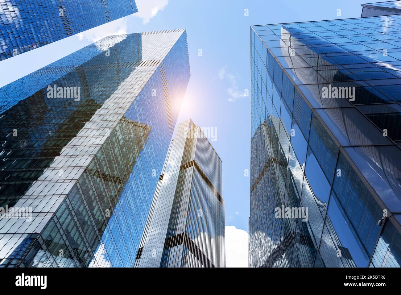 Fresh Look at Modern Glass Silhouettes Of Skyscrapers In The City Bottom View
