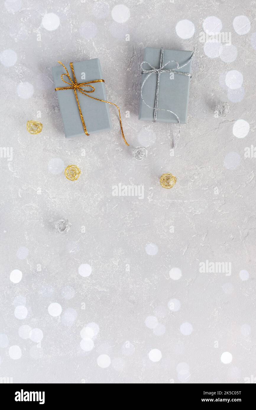 Christmas gift boxes on the grey festive background, top view, copy space Stock Photo