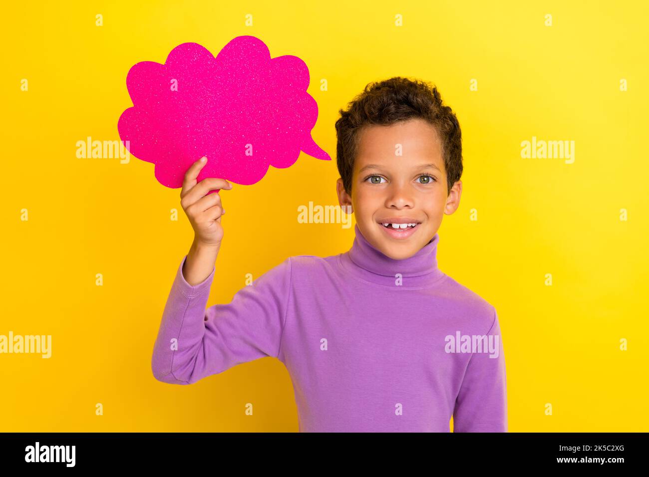 Photo of positive boy hand hold empty space paper cloud shape card ...