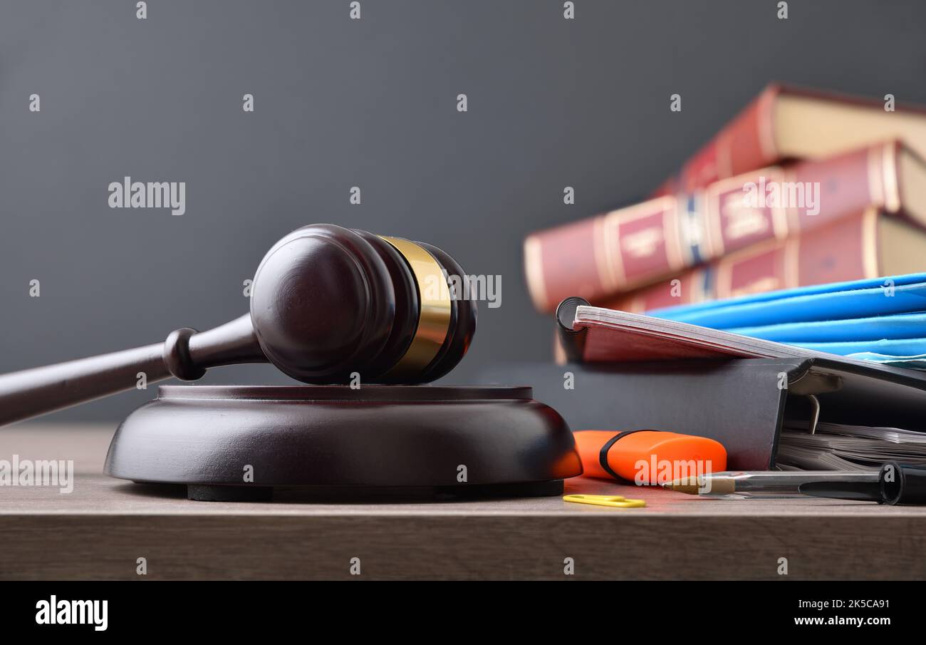 Concept of studying law career with books and class tools and gavel on