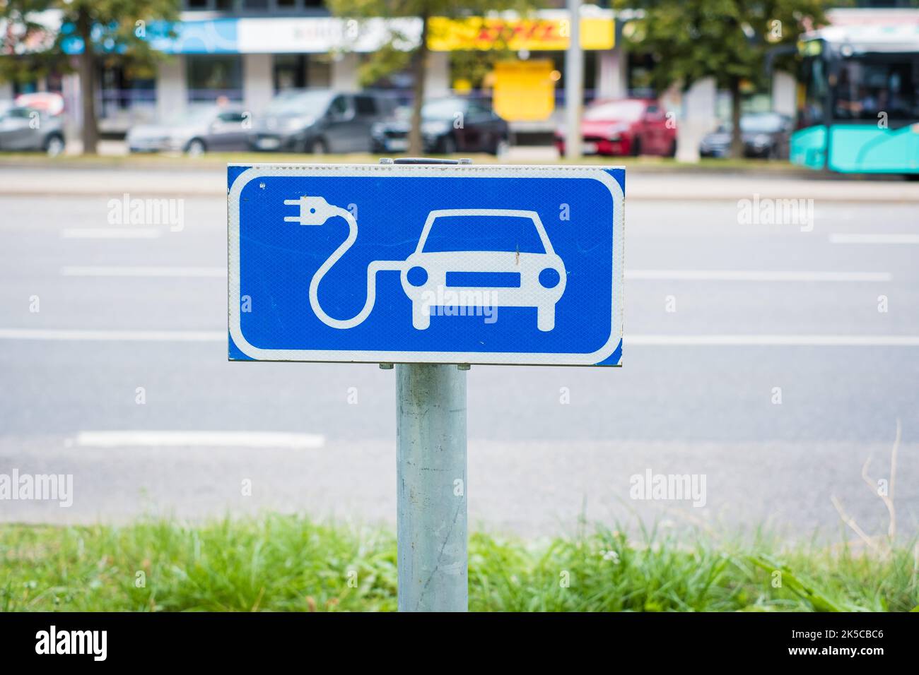 Public electrical vehicle charging point traffic sign. Stock Photo