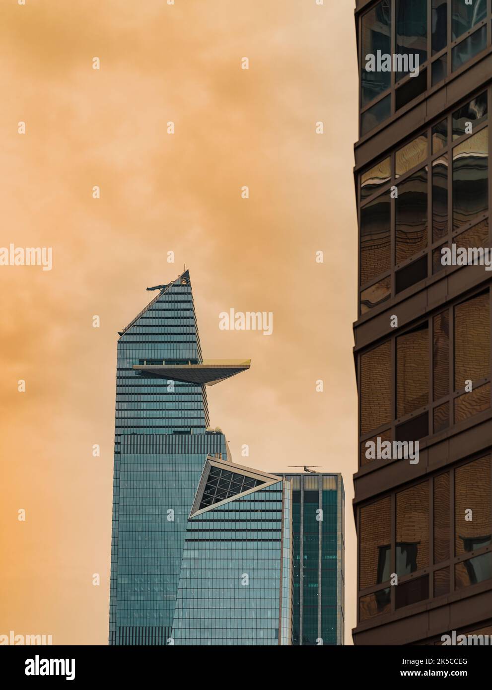 modern office building in downtown city sunset sky New York Stock Photo ...