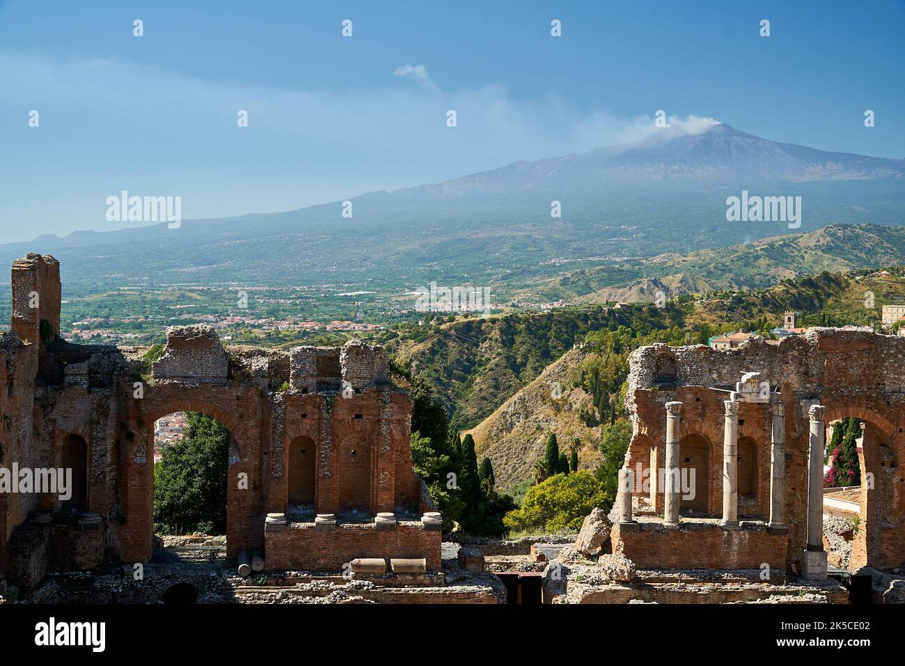 Mount Etna seen from Old Greek Theater in Taormina, Sicily, Italy Stock