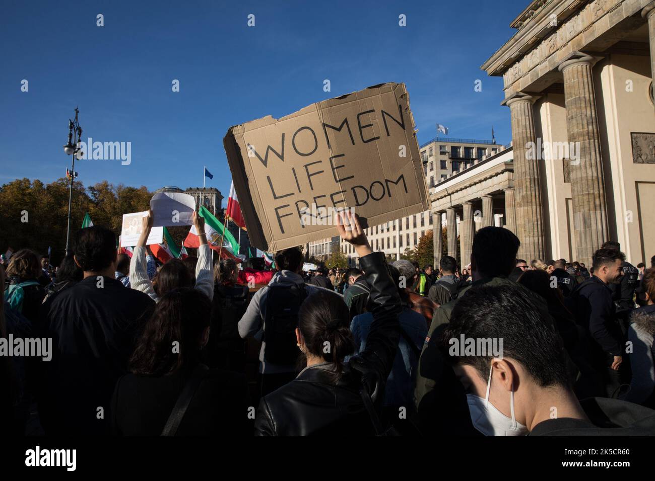 Berlin, Germany. 7th Oct, 2022. Protesters gathered at the Brandenburg Gate in Berlin on October 7, 2022, in solidarity with the protests in Iran. The protesters protested against the Mullah regime in Iran and expressed their sadness about the death of Mahsa Amini. The protesters also took to the streets against state violence and insufficient women's rights in Iran. (Credit Image: © Michael Kuenne/PRESSCOV via ZUMA Press Wire) Stock Photo