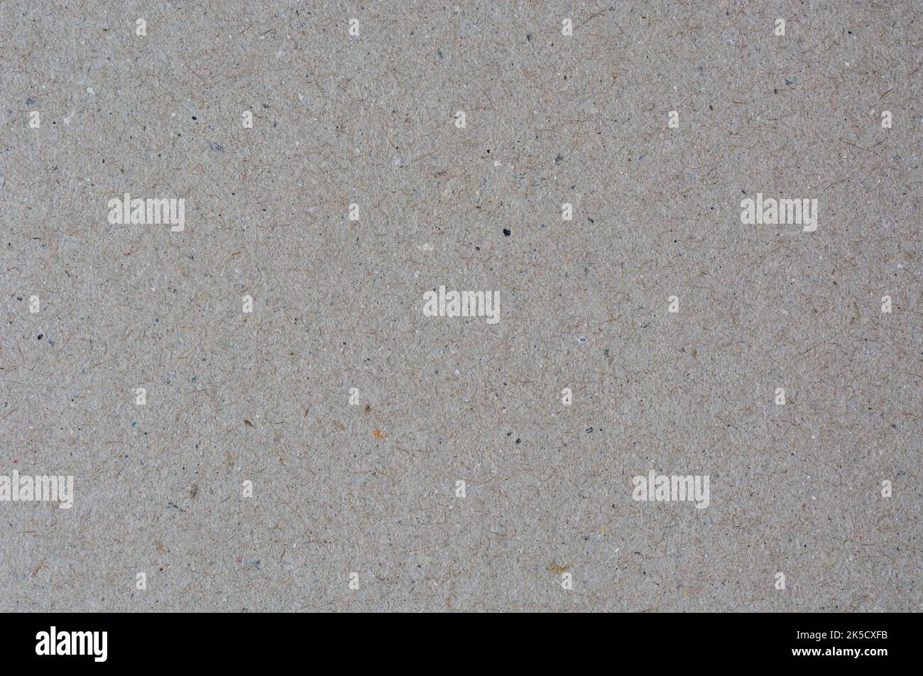 binders board surface, thick, rigid paperboard used in construction of hard book covers, binding boards made from acid-free paste paper, close-up Stock Photo