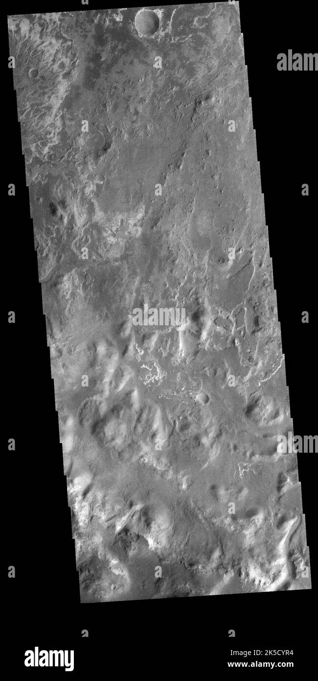 At the top left corner of today's VIS image is the delta deposit located on the floor of Eberswalde Crater. Deltas are formed when sediment laden rivers slow down – either due to a flattening of topography, or entering a standing body of water. The reduction in velocity causes the sediments to be deposited. The main channel often diverges into numerous smaller channel that spread apart to form the typical fan shape of a delta. The Eberswalde Crater delta is one of the best preserved on Mars. Orbit Number 90982 Latitude -24.1271 Longitude 326.604 Instrument VIS Captured 2022-06-18 18 13 Stock Photo