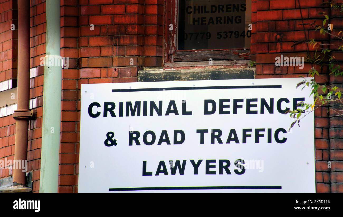 Criminal defence and road traffic lawyers sign Stock Photo