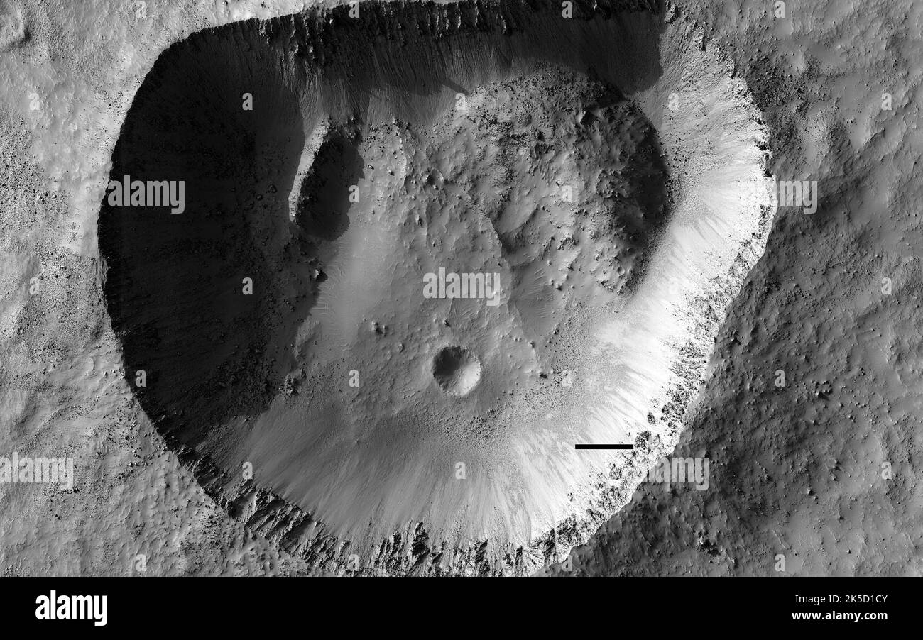 This oddshaped hole in Noachis Terra is clearly an impact crater. It