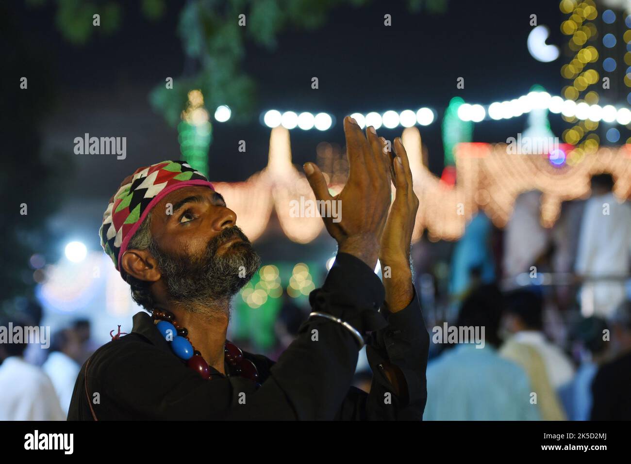 Pakistani Muslim devotees (Malang) take part in 399th URS birth anniversary celebrations on the second day at the shrine of famous fifteenth-century Sufi Saint Hazrat Mir Mohammed Muayyinul in Lahore, Pakistan on Oct. 5, 2022. Thousands of people across the country visit the shrine to pay tribute to him during a three-day festival. The saint was equally popular among the Muslim and Sikh religions, as Mian Mir went to Amritsar (India) in December 1588 to lay the foundation stone of Sikhs holiest site, the Golden Temple, which is commonly known as Sri Harminder Sahib. (Photo by Rana Sajid Hussai Stock Photo