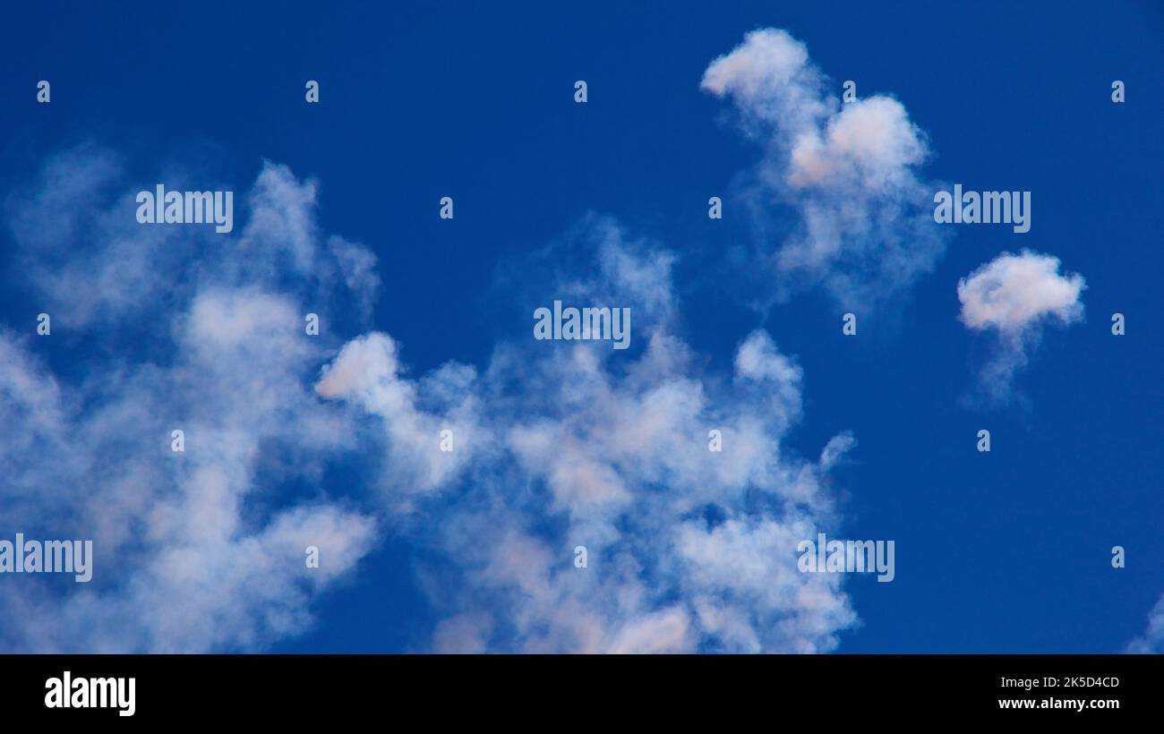 Italy, Sicily, baroque angle, baroque town, Scigli, smoke traces of firecracker shots in blue sky Stock Photo