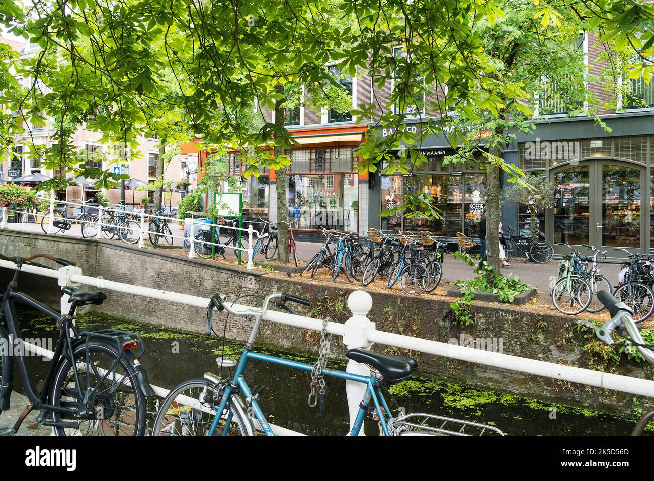 Delft (Netherlands), historic old town, voorstraat, canal, bicycles Stock Photo