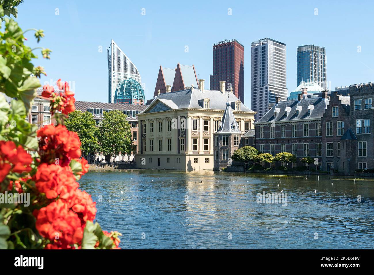 The modern facade of The Hague's City Hall with glass and white panels.
