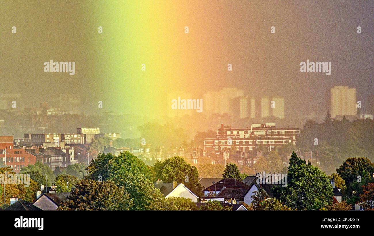 Paisley, Glasgow, Scotland, UK 7th October, 2022. UK Weather Rainbow visits high rises as the