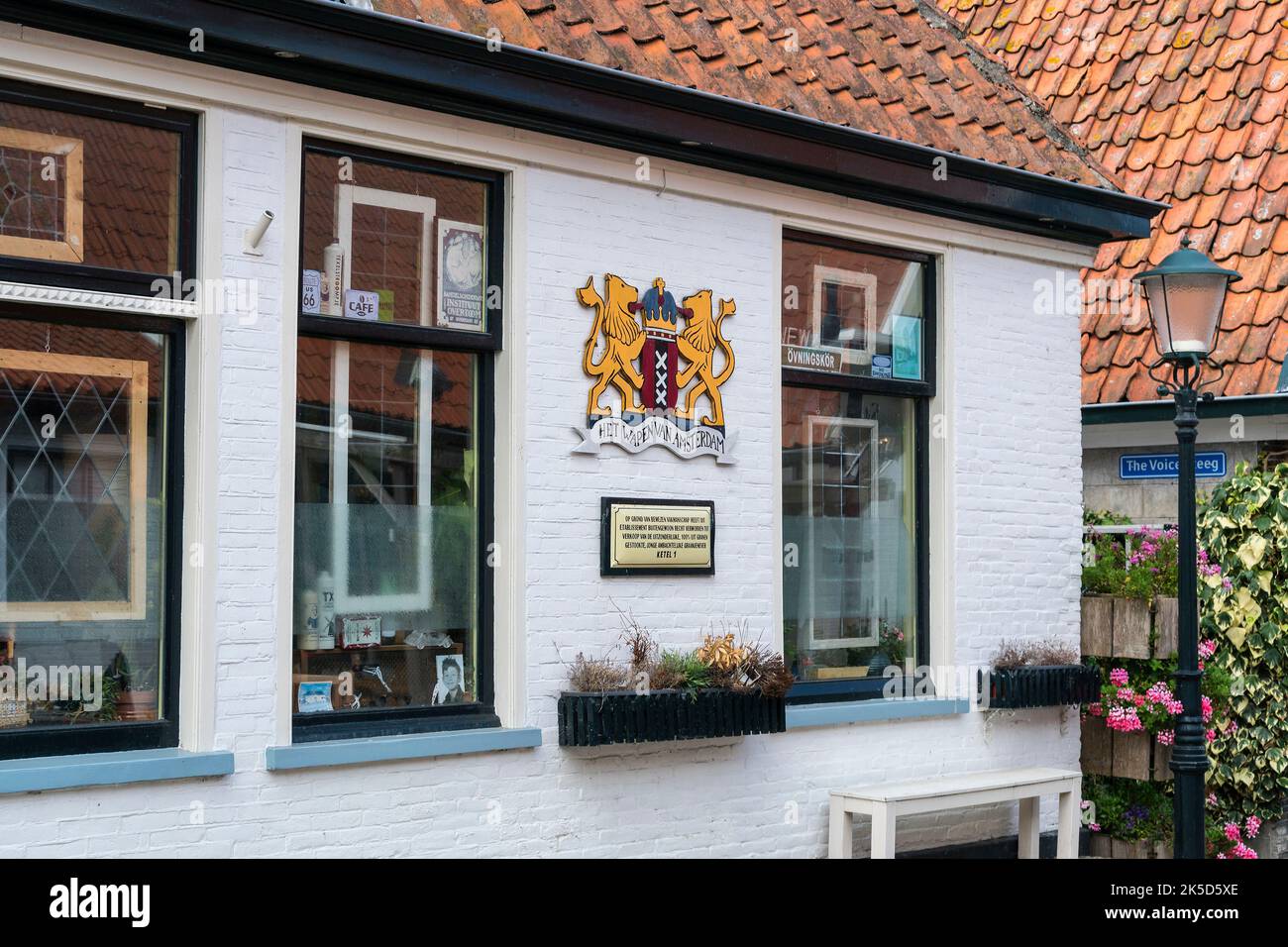 Netherlands, Texel, fishing village Oosterend, house with coat of arms Stock Photo